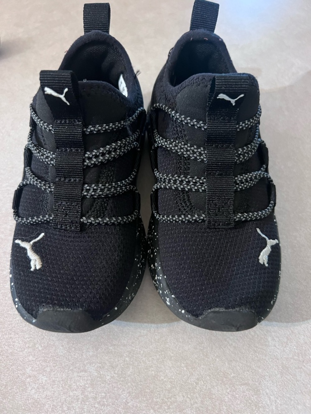 Puma Kids Black Knit Slip-On Sneakers with White Accents worn a few times